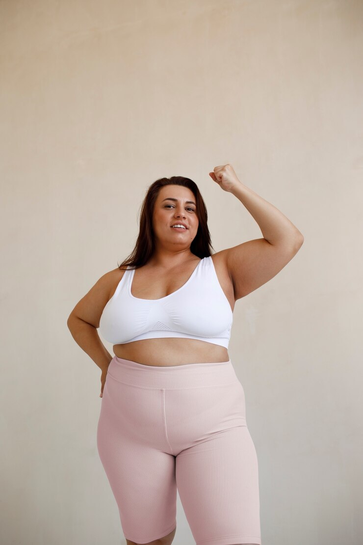 medium-shot-plus-size-model-posing-studio_23-2150738599